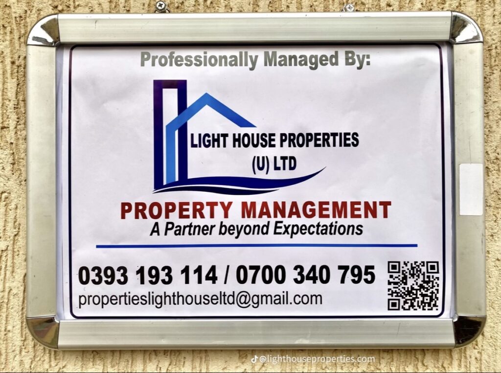 A professional real estate appraiser using a checklist for How to Value a Property in Kampala.